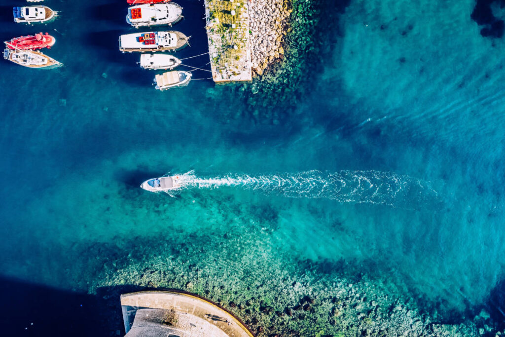 Greece yacht charter sailing through beautiful azure waters of the Mediterranean. 
